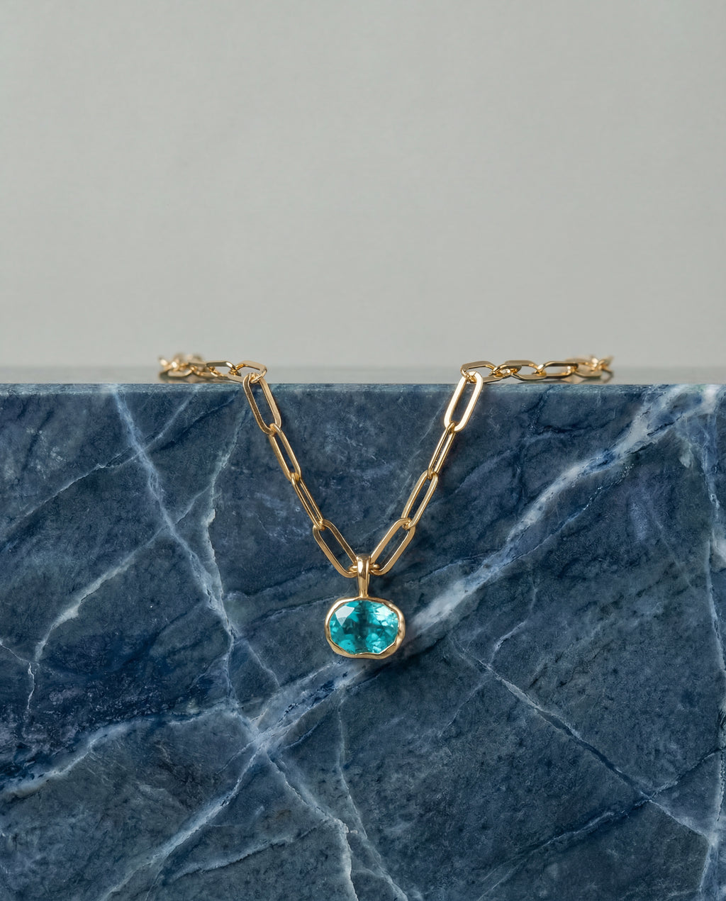 Paraiba Blue Tourmaline pendant in 10k yellow hammered gold bezel