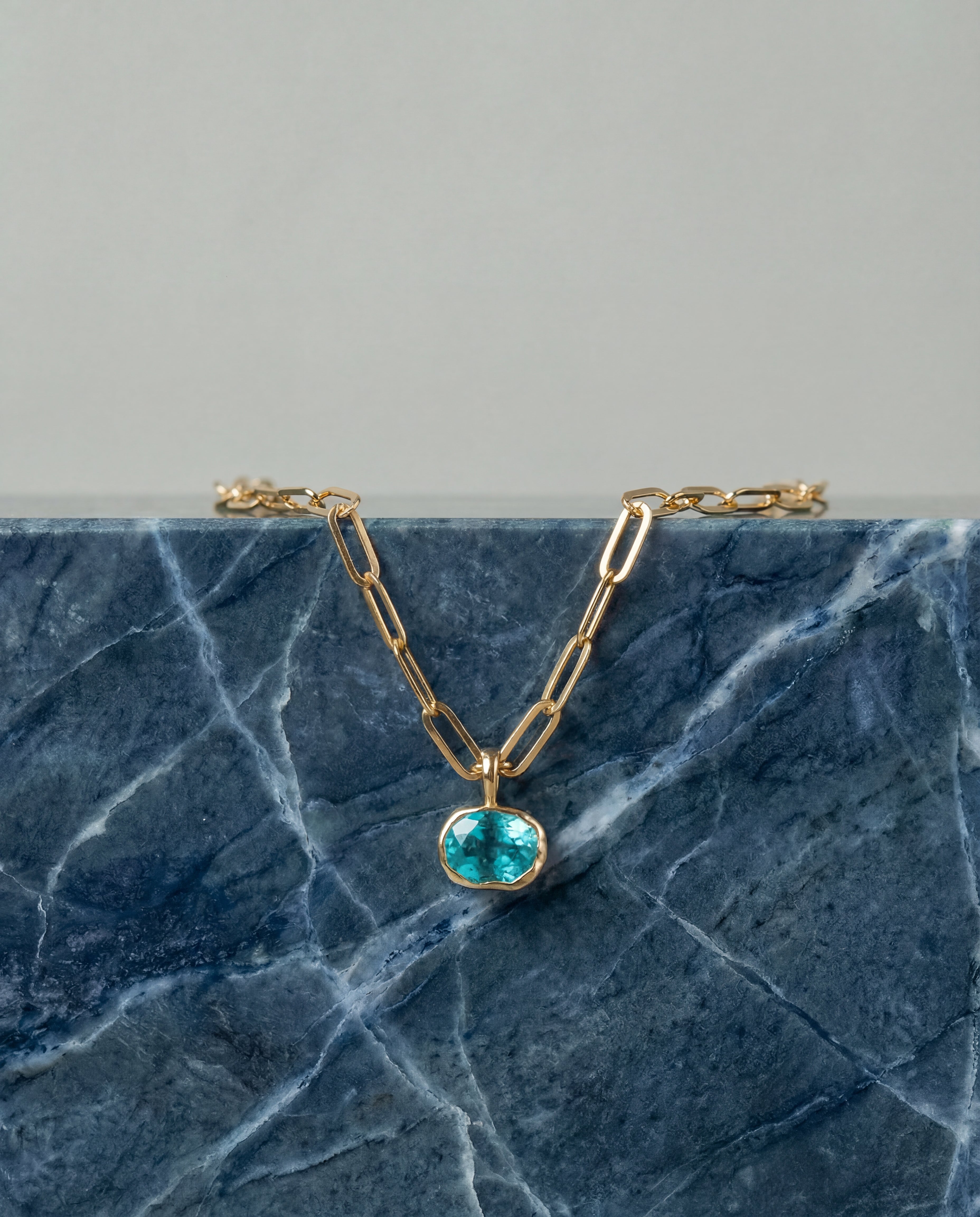 Paraiba Blue Tourmaline pendant in 10k yellow hammered gold bezel