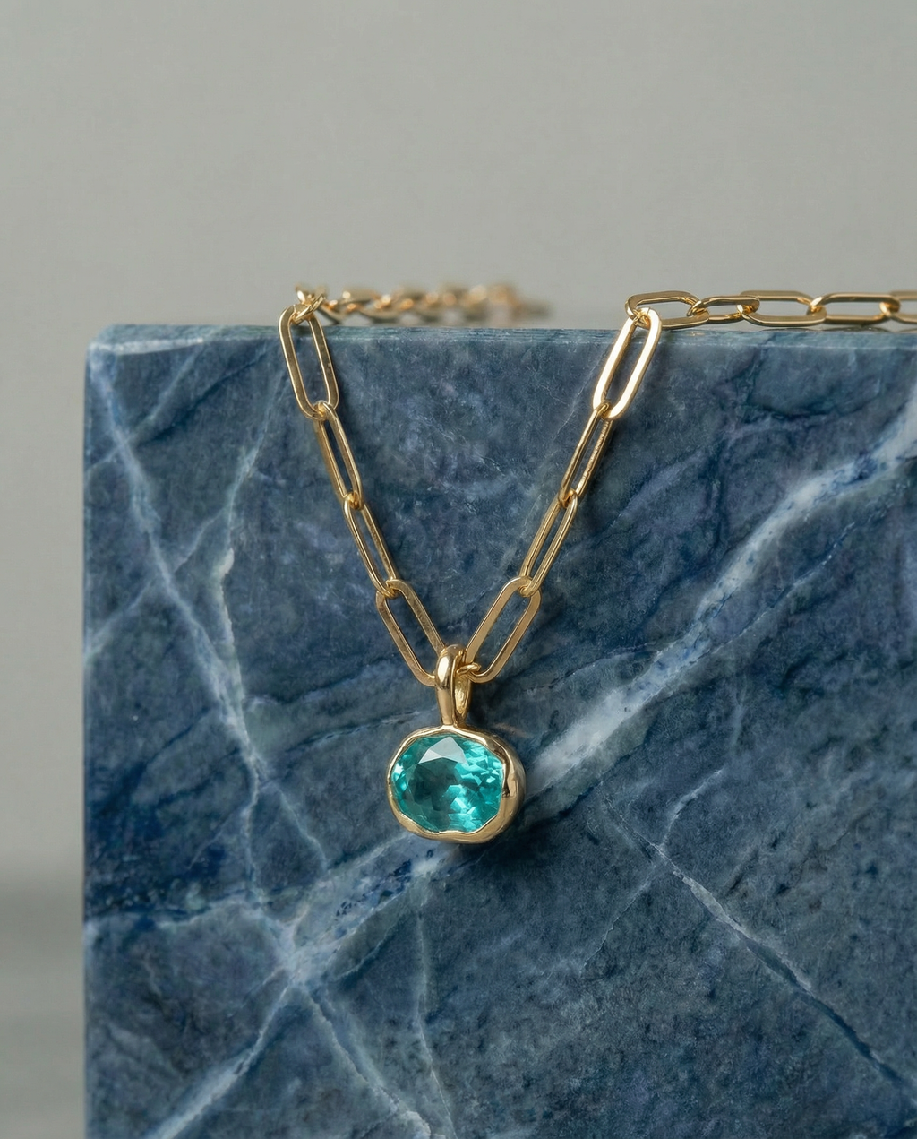 Paraiba Blue Tourmaline pendant in 10k yellow hammered gold bezel