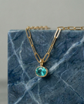 Paraiba Blue Tourmaline pendant in 10k yellow hammered gold bezel