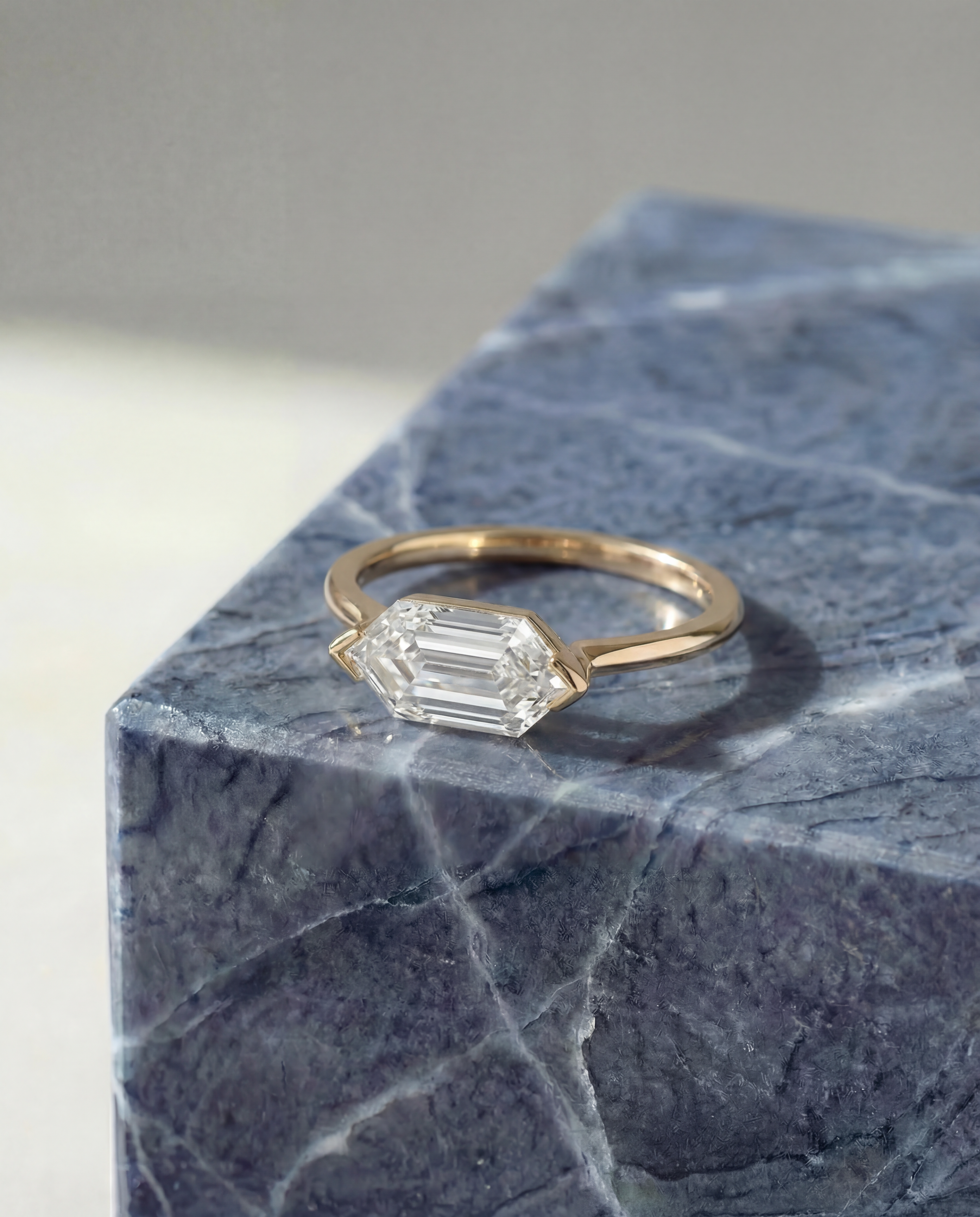 Step Cut Dutch Marquise Ring East-West Set with half bezel
