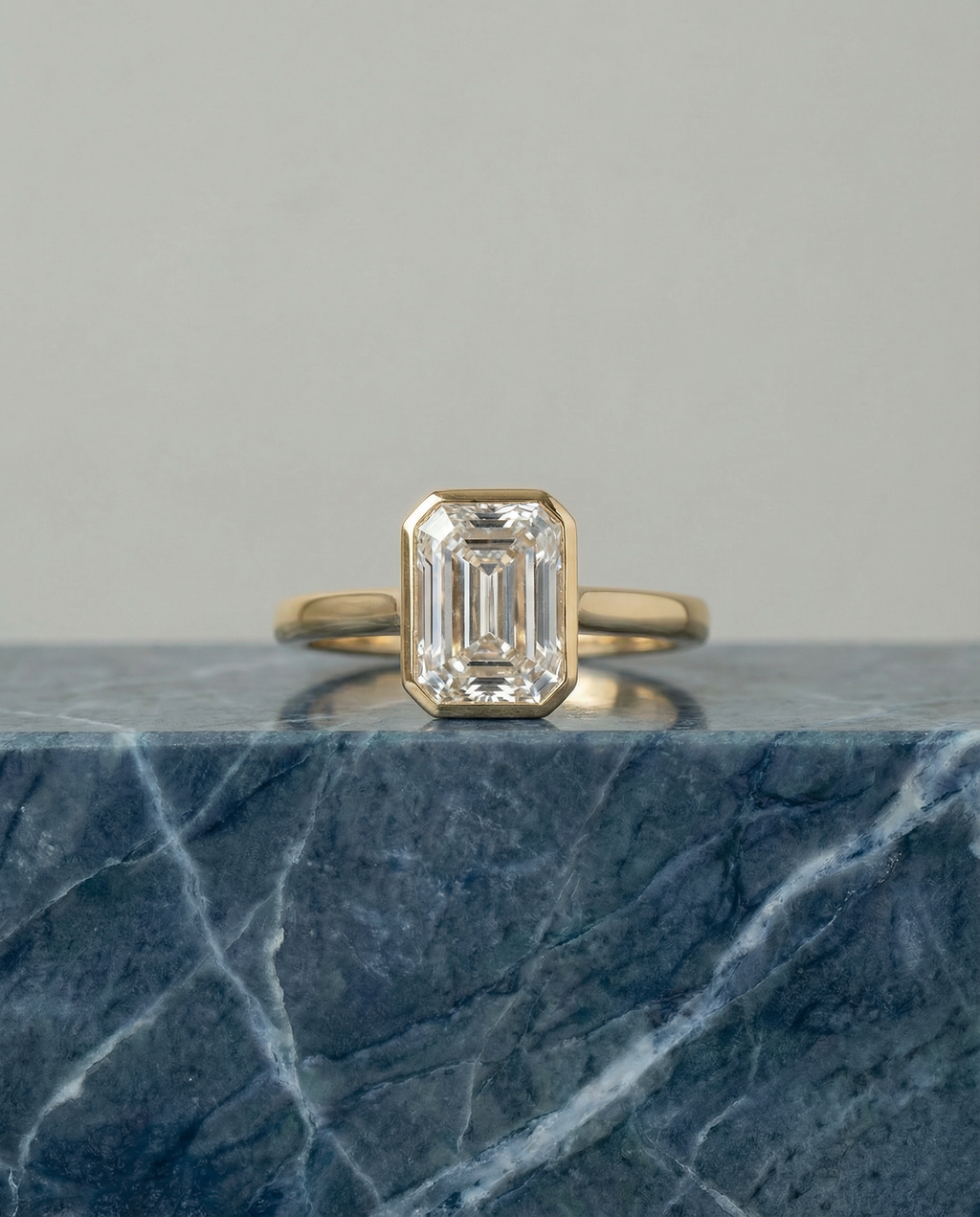 Emerald Cut Diamond Ring in 18k Yellow Gold Bezel