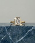 Emerald Cut Diamond Ring in 18k Yellow Gold Bezel