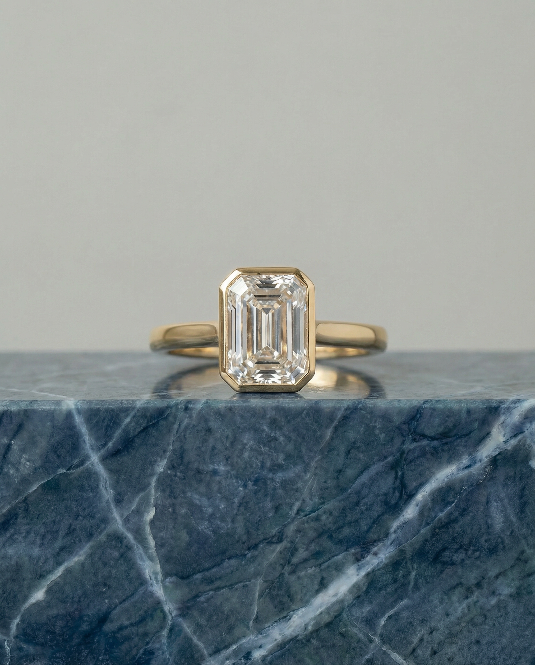 Emerald Cut Diamond Ring in 18k Yellow Gold Bezel