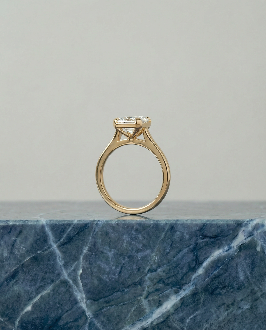 Emerald Cut Engagement Ring in 18k Yellow Gold with Bezel