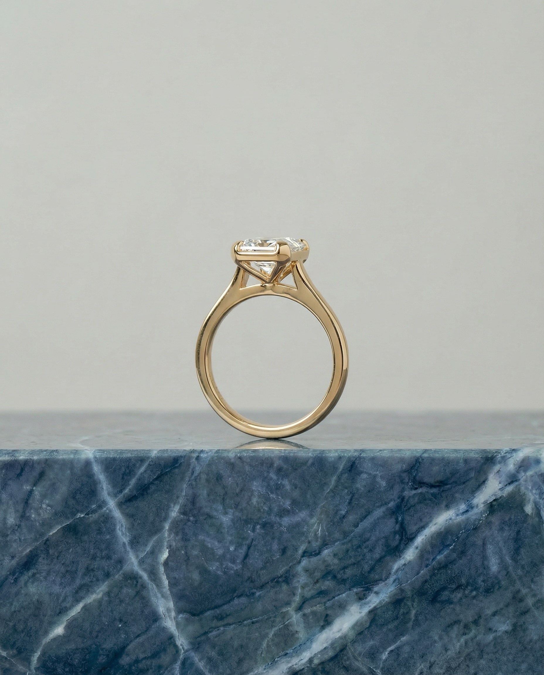 Emerald Cut Engagement Ring in 18k Yellow Gold with Bezel